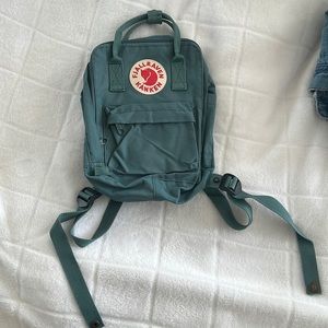 Miniature Fjallraven Kanken backpack. Worn twice and in perfect condition.